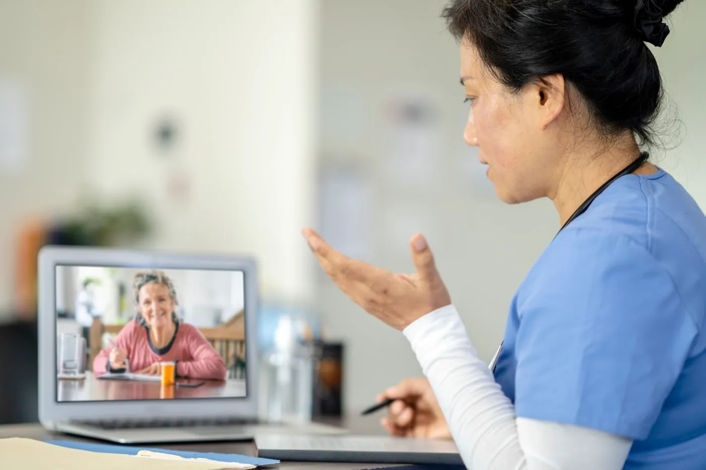 Nurse on video call with patient